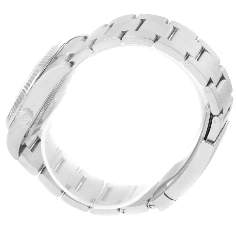 This image shows a side view of the Rolex Air-King 114234 Men's Stainless Steel White Dial 114234 Men's Stainless Steel White Dial watch, highlighting its bracelet and part of the case.
