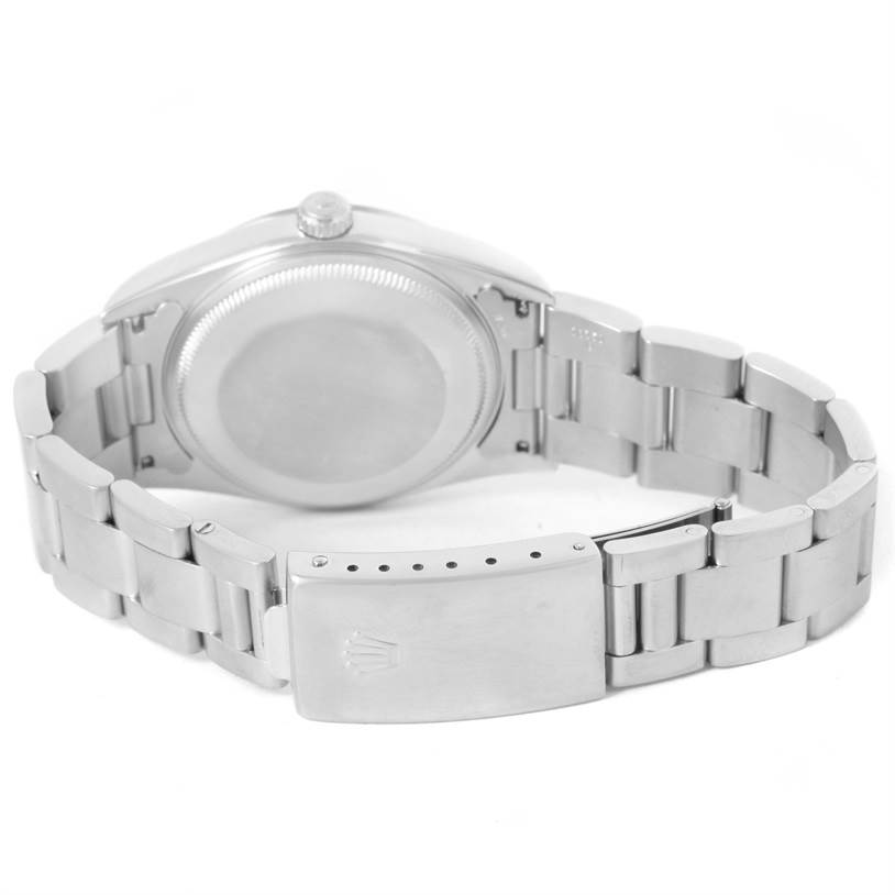 The image shows the back view of a Rolex Air-King 14000 Men's Stainless Steel Silver Dial 14000 Men's Stainless Steel Silver Dial watch, focusing on the case back and metal bracelet with the clasp.