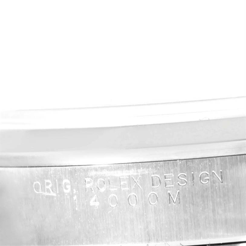 This image shows a close-up of the case side of a Rolex Air-King 14000 Men's Stainless Steel Silver Dial 14000 Men's Stainless Steel Silver Dial watch, featuring the engraving "ORIG. ROLEX DESIGN 14000M".
