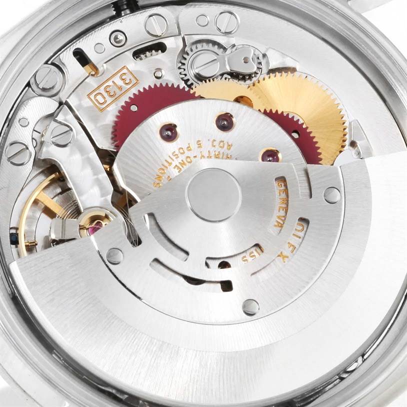 This is a close-up shot of the internal mechanism of the Rolex Air-King 14000 Men's Stainless Steel Silver Dial 14000 Men's Stainless Steel Silver Dial watch, showing gears and movement components.