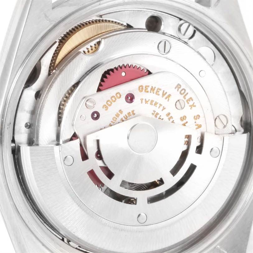 This image shows the internal mechanism of the Rolex Air-King 14000 Men's Stainless Steel Blue Dial 14000 Men's Stainless Steel Blue Dial watch, focusing on its movement and gears.