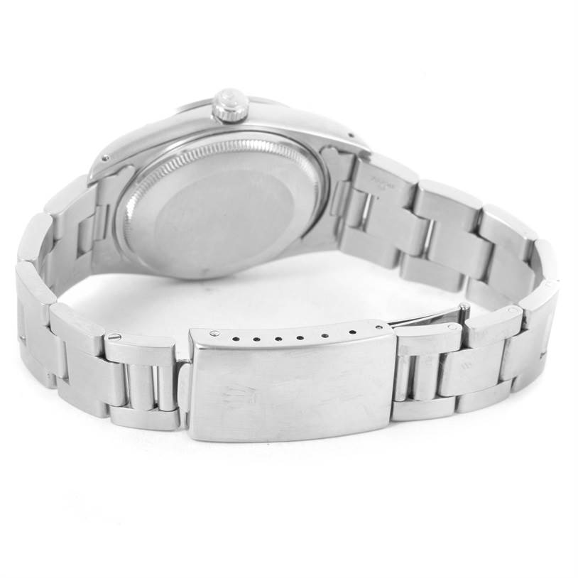 The image shows the back of a Rolex Air-King 14000 Men's Stainless Steel Blue Dial 14000 Men's Stainless Steel Blue Dial watch, including the case back, bracelet, and clasp.