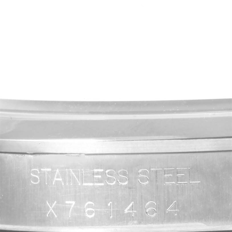 The image shows an angled close-up of the stainless steel band with the serial number for the Rolex Air-King 14000 Men's Stainless Steel Blue Dial 14000 Men's Stainless Steel Blue Dial watch.