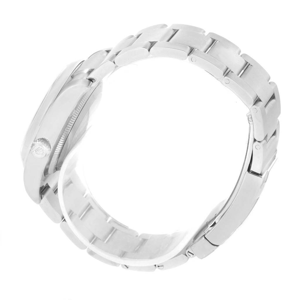 The image shows the side view of a Rolex Air-King 114200BLASO Men's Stainless Steel Blue Dial 114200BLASO Men's Stainless Steel Blue Dial watch focusing on the bracelet and the crown.