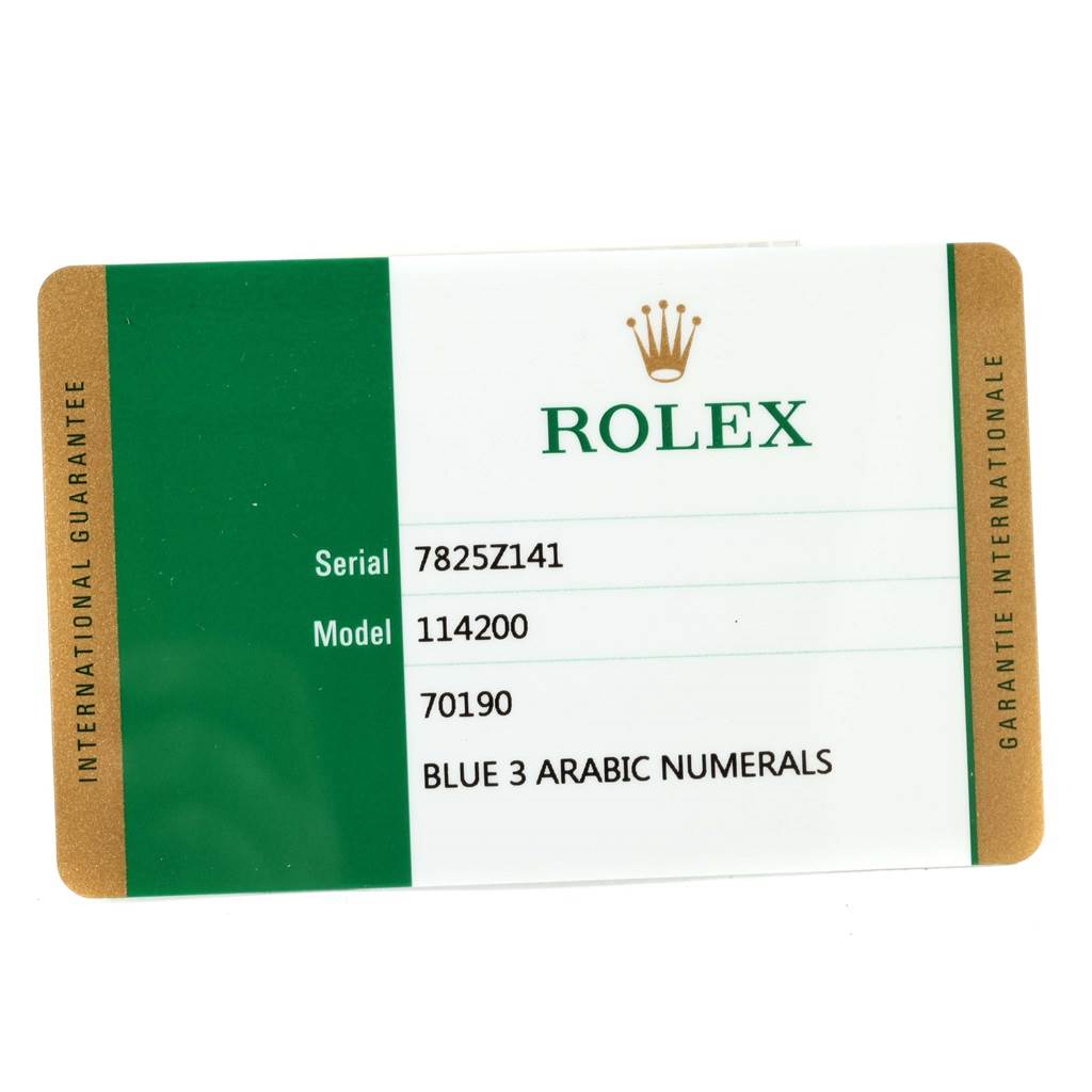 This image shows a warranty card for a Rolex Air-King 114200BLASO Men's Stainless Steel Blue Dial 114200BLASO Men's Stainless Steel Blue Dial model 114200 watch.