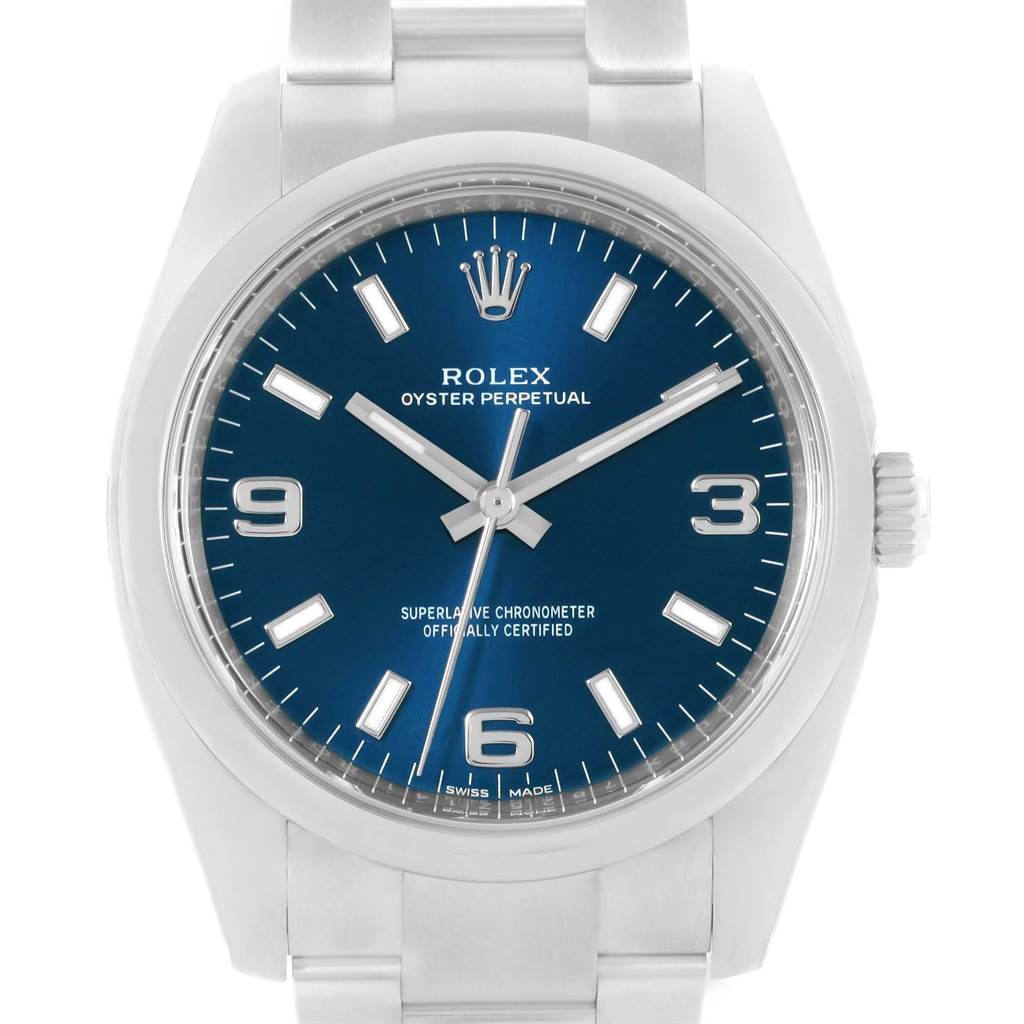 The image shows a front view of a Rolex Air-King 114200BLASO Men's Stainless Steel Blue Dial 114200BLASO Men's Stainless Steel Blue Dial watch, highlighting the dial, hour markers, and part of the bracelet.