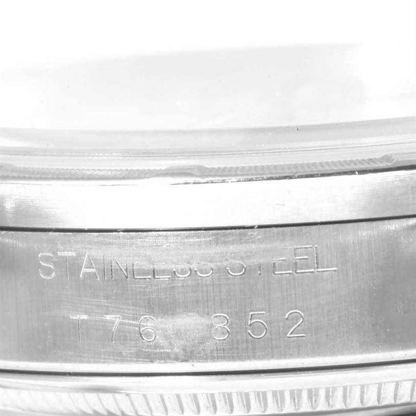 This image shows a close-up view of the casing side of a Rolex Air-King 14010 Men's Stainless Steel White Dial 14010 Men's Stainless Steel White Dial watch, highlighting the "Stainless Steel" engraving.