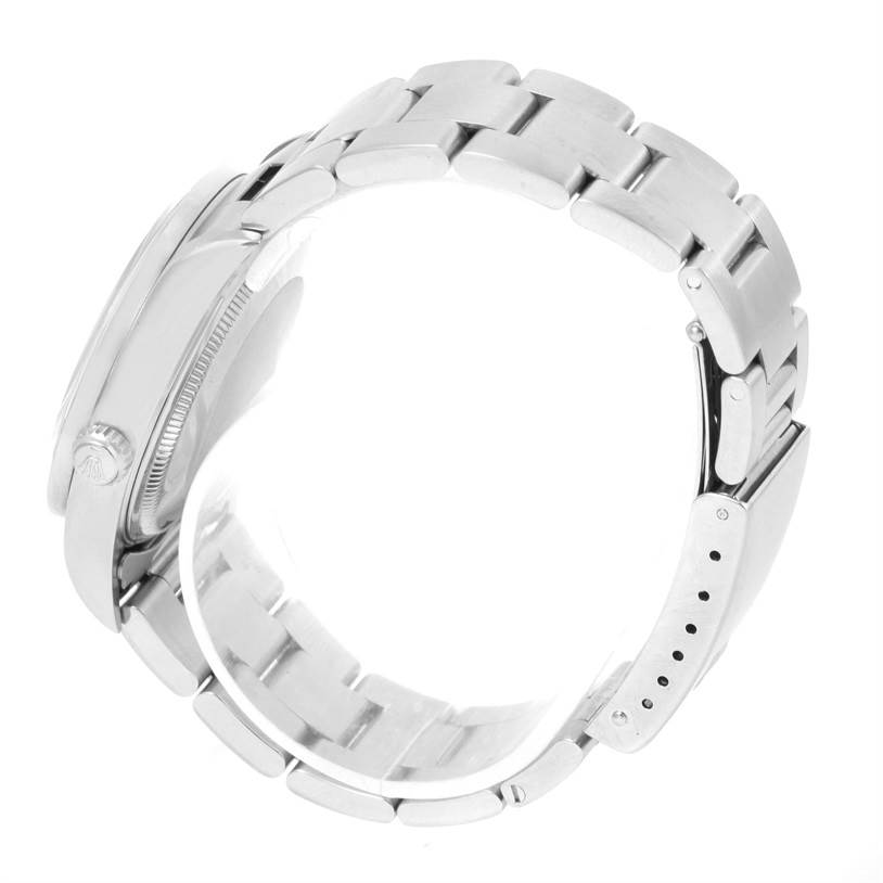 The image shows a side view of a Rolex Air-King 14010 Men's Stainless Steel White Dial 14010 Men's Stainless Steel White Dial watch, highlighting its bracelet, clasp, and part of the case.