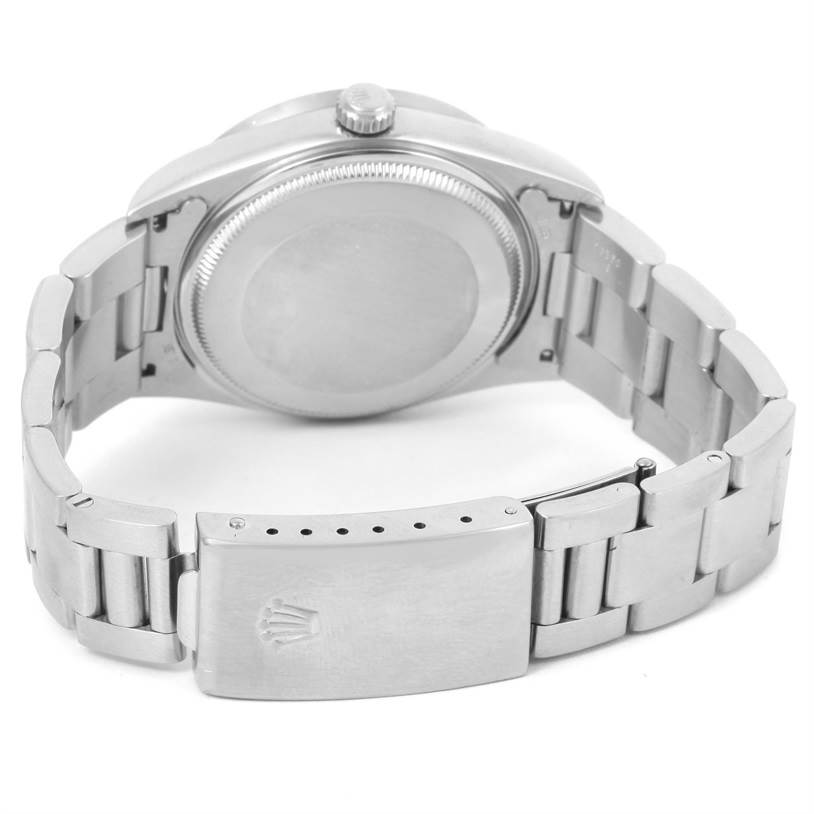 The image shows the back case and bracelet of a Rolex Air-King 14010 Men's Stainless Steel White Dial 14010 Men's Stainless Steel White Dial watch, focusing on the clasp with the Rolex logo.