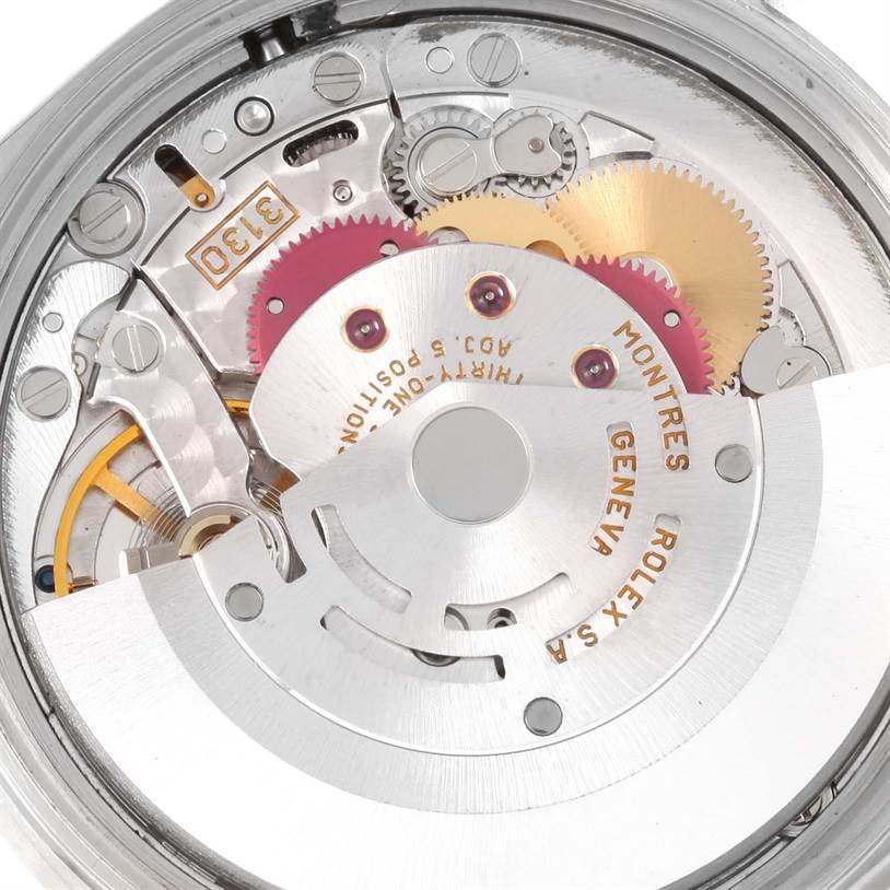 The image shows the internal mechanism of the Rolex Air-King 14010 Men's Stainless Steel Blue Dial 14010 Men's Stainless Steel Blue Dial watch, highlighting gears and components from a close-up angle.