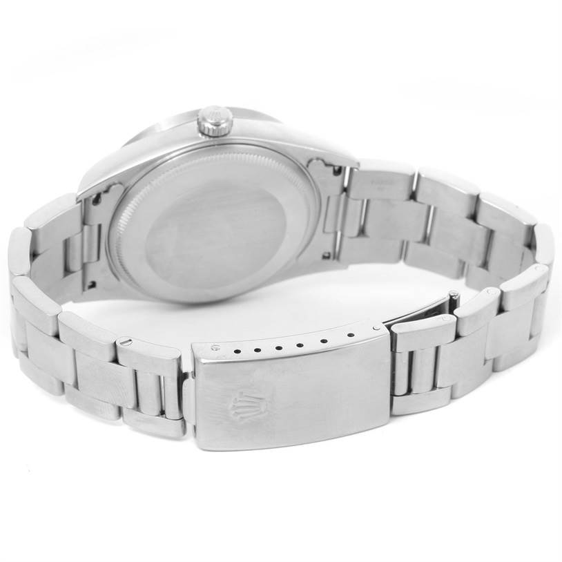 The image shows the back view of a Rolex Air-King 14010 Men's Stainless Steel Blue Dial 14010 Men's Stainless Steel Blue Dial watch, highlighting the bracelet and clasp.