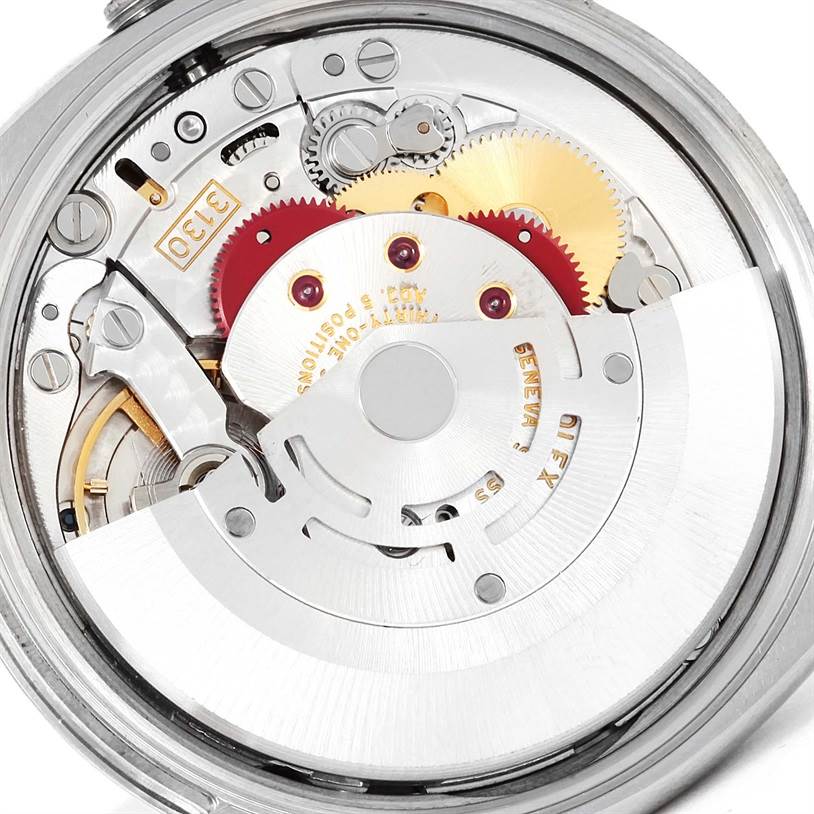 The image shows the internal movement mechanism of the Rolex Air-King 114200 Men's Stainless Steel White Dial 114200 Men's Stainless Steel White Dial watch, including gears and the rotor.