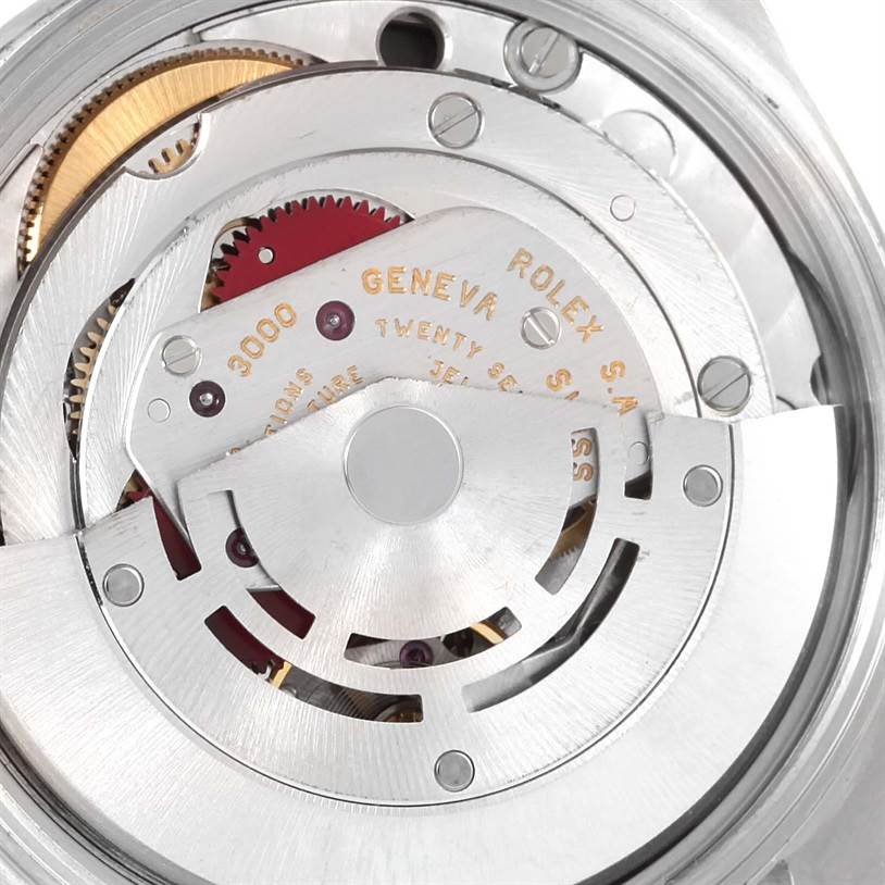 The image shows a close-up view of the movement mechanism inside the Rolex Air-King 14010 Stainless Steel Black Dial 14010 Stainless Steel Black Dial watch.