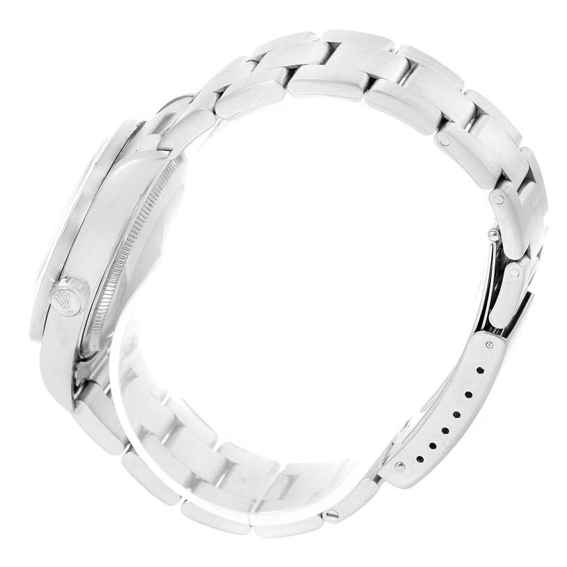 This image shows a side view of the Rolex Air-King 14010 Stainless Steel Black Dial 14010 Stainless Steel Black Dial watch highlighting its case, crown, and metal bracelet.