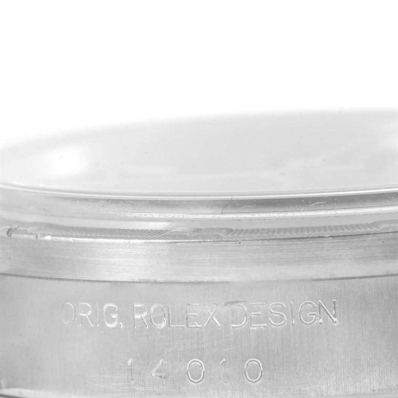 The image shows a detailed close-up of the side of a Rolex Air-King 14010 Stainless Steel Black Dial 14010 Stainless Steel Black Dial watch case, highlighting the engraved model number "14010" and "ORIG. ROLEX DESIGN."