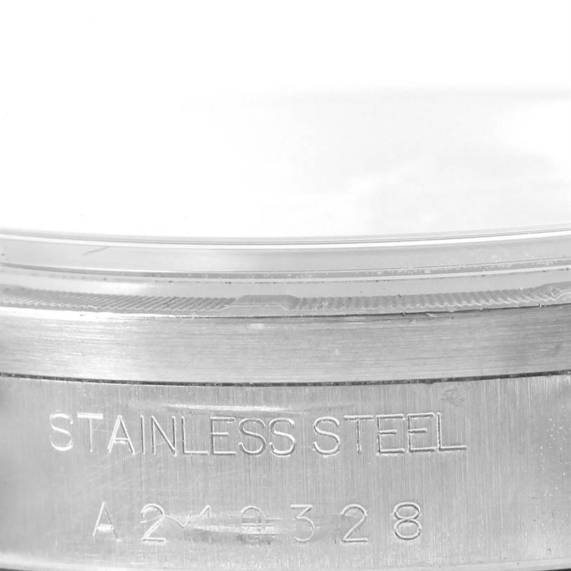 This close-up image shows the engraved details on the bezel of a Rolex Air-King 14010 Stainless Steel Black Dial 14010 Stainless Steel Black Dial watch, focusing on the "Stainless Steel" marking.