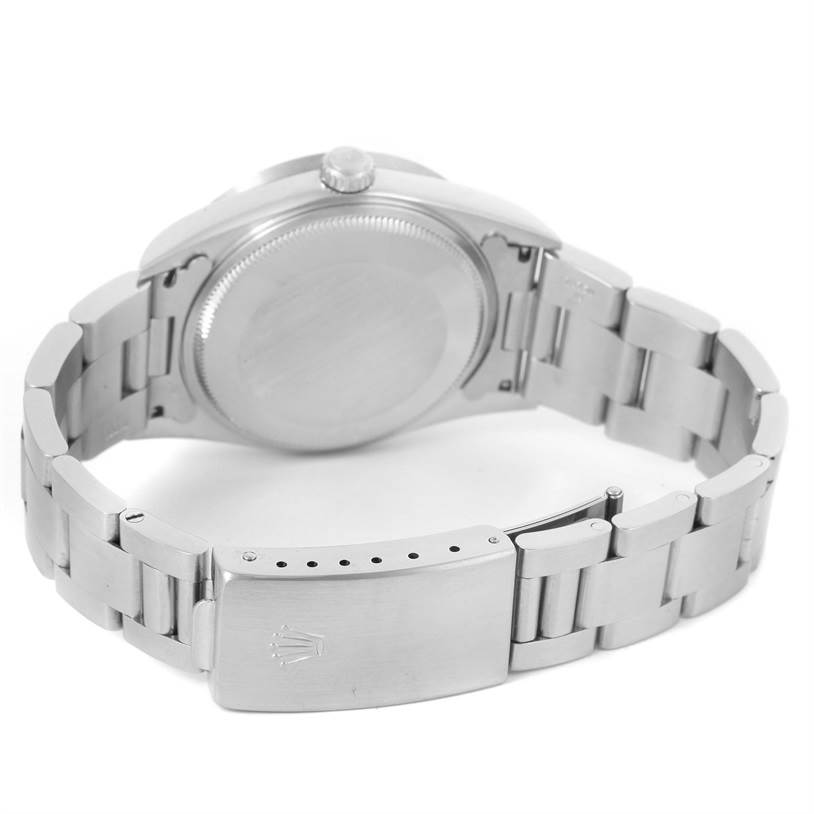 The image shows the back view of a Rolex Air-King 14010 Men's Stainless Steel White Dial 14010 Men's Stainless Steel White Dial watch, highlighting the closed clasp, case back, and part of the bracelet.