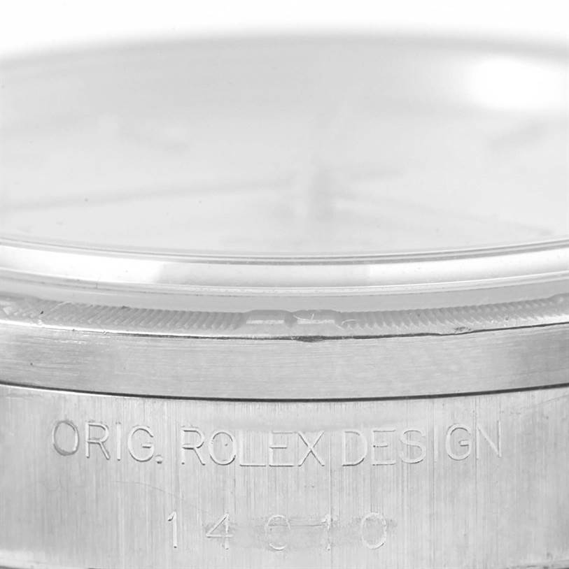 The image shows a close-up of the casing and bezel of a Rolex Air-King 14010 Men's Stainless Steel Silver Dial 14010 Men's Stainless Steel Silver Dial watch.
