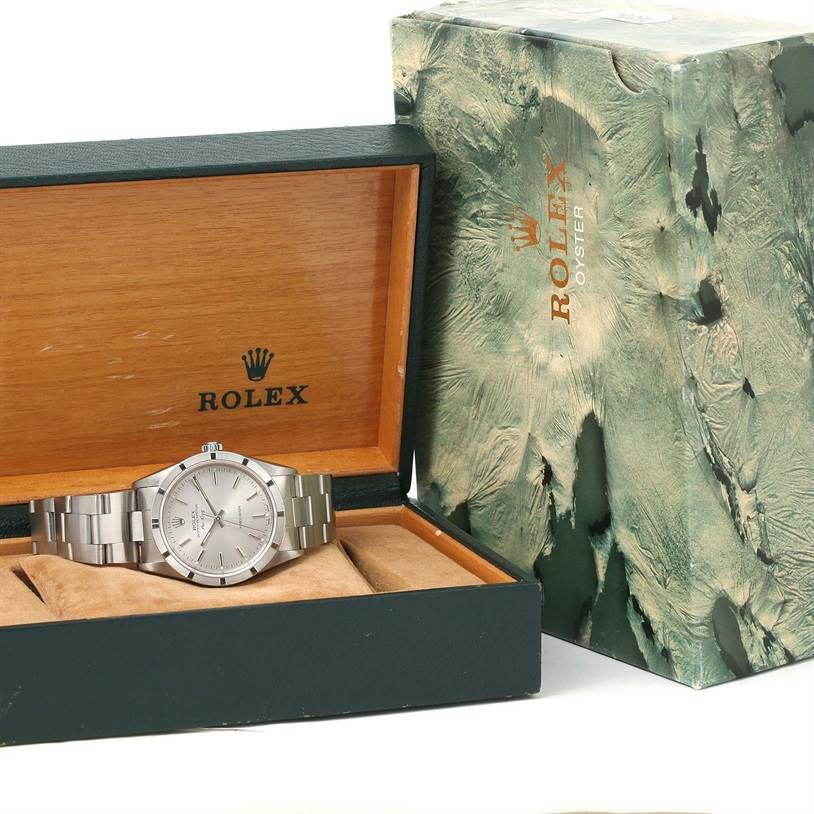 The image shows a Rolex Air-King 14010 Men's Stainless Steel Silver Dial 14010 Men's Stainless Steel Silver Dial watch in its open box with the outer packaging beside it.
