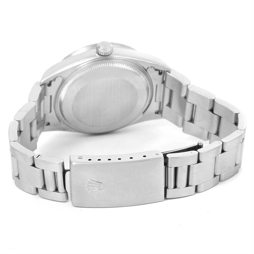 The image shows the back case, crown, and bracelet clasp of a Rolex Air-King 14010 Men's Stainless Steel Silver Dial 14010 Men's Stainless Steel Silver Dial watch.