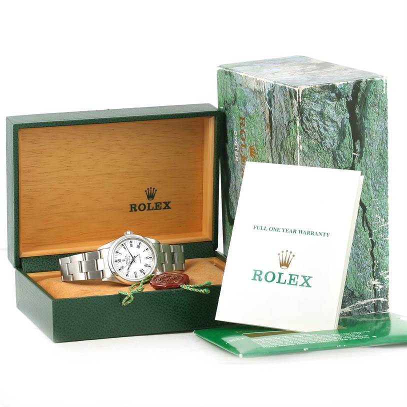 The image shows a Rolex Air-King 14000 Men's Stainless Steel White Dial 14000 Men's Stainless Steel White Dial watch placed in an open box with warranty papers and accompanying packaging visible.