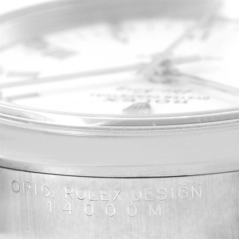 The image shows a close-up, side-angle view of the bezel and part of the dial of a Rolex Air-King 14000 Men's Stainless Steel White Dial 14000 Men's Stainless Steel White Dial watch, with the model number engraved.