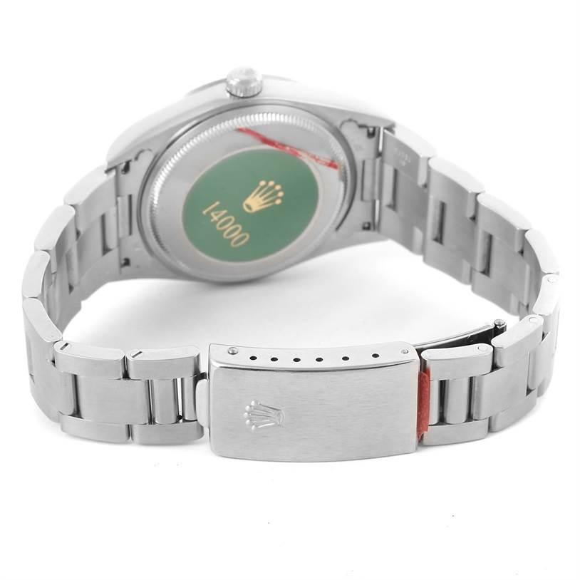 The image shows the back view and clasp of a Rolex Air-King 14000 Men's Stainless Steel White Dial 14000 Men's Stainless Steel White Dial watch, highlighting the bracelet and caseback details.