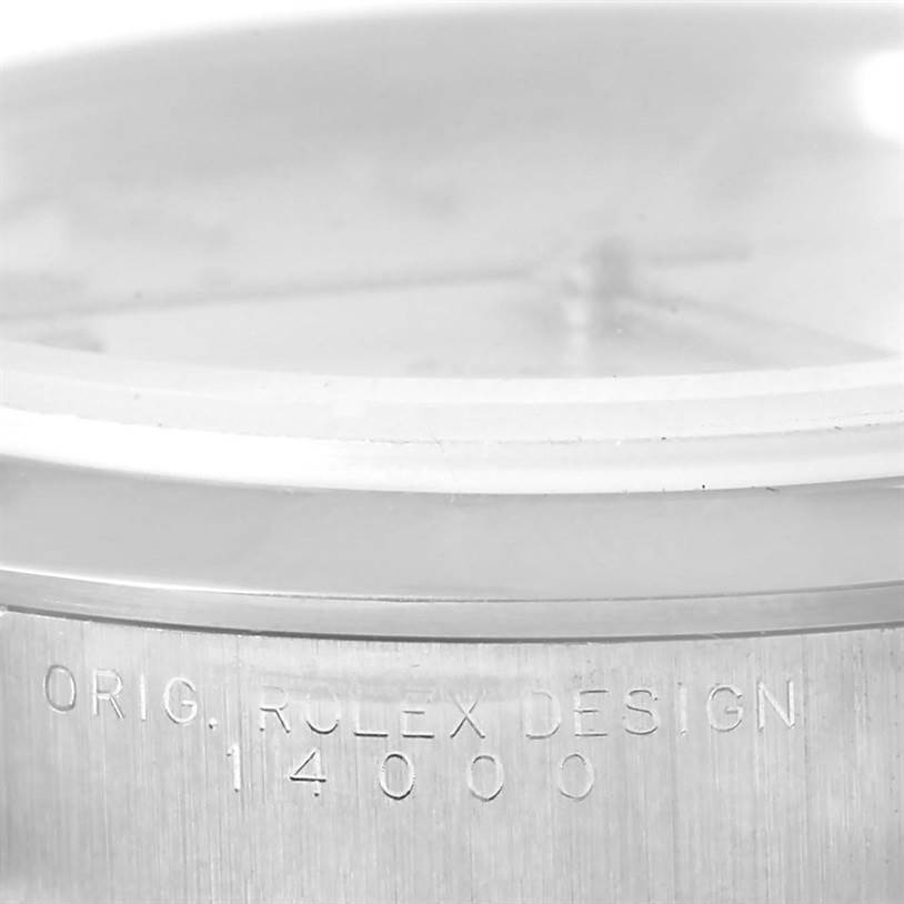 This close-up image shows the casing side of a Rolex Air-King 14000 Men's Stainless Steel Silver Dial 14000 Men's Stainless Steel Silver Dial watch, with model number engraving "14000".