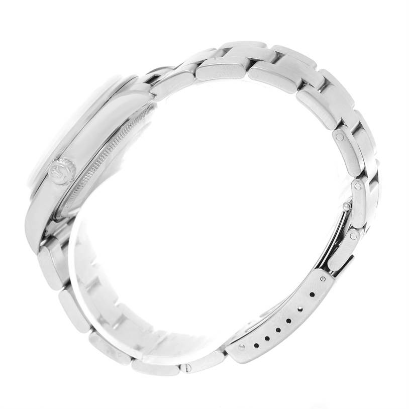 This Rolex Air-King 14000 Men's Stainless Steel Silver Dial 14000 Men's Stainless Steel Silver Dial watch is shown from a side angle, highlighting its case and the stainless steel bracelet with clasp.