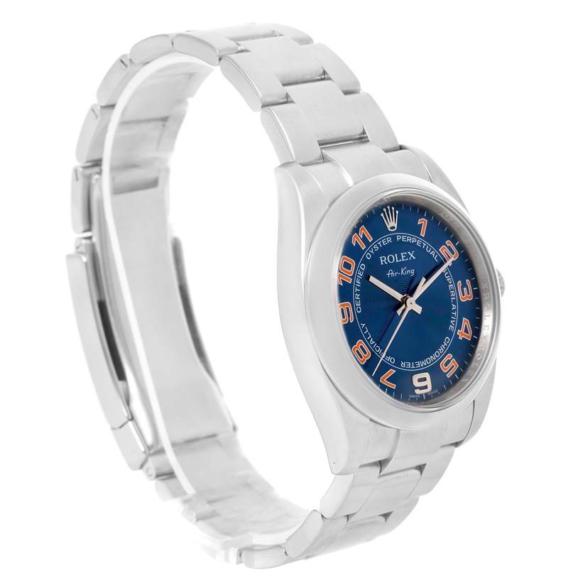 The image shows a Rolex Air-King 114200 Men's Stainless Steel Blue Dial 114200 Men's Stainless Steel Blue Dial watch at a slight angle, featuring its bracelet, clasp, and blue dial with orange numerals.