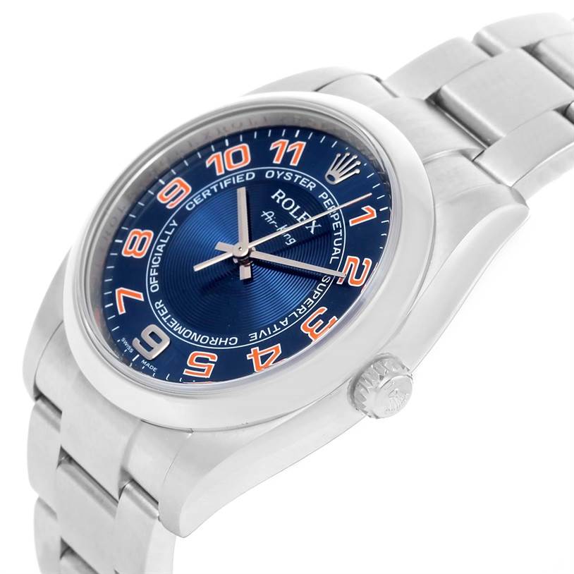 The image showcases a Rolex Air-King 114200 Men's Stainless Steel Blue Dial 114200 Men's Stainless Steel Blue Dial watch at a three-quarter angle, highlighting the dial, bezel, crown, and a portion of the bracelet.
