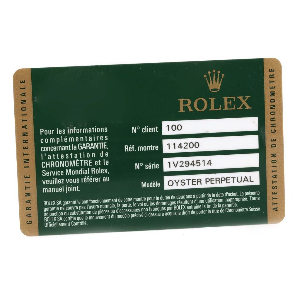The image shows a warranty card for the Air-King model by Rolex, including client number, reference number, and serial number.