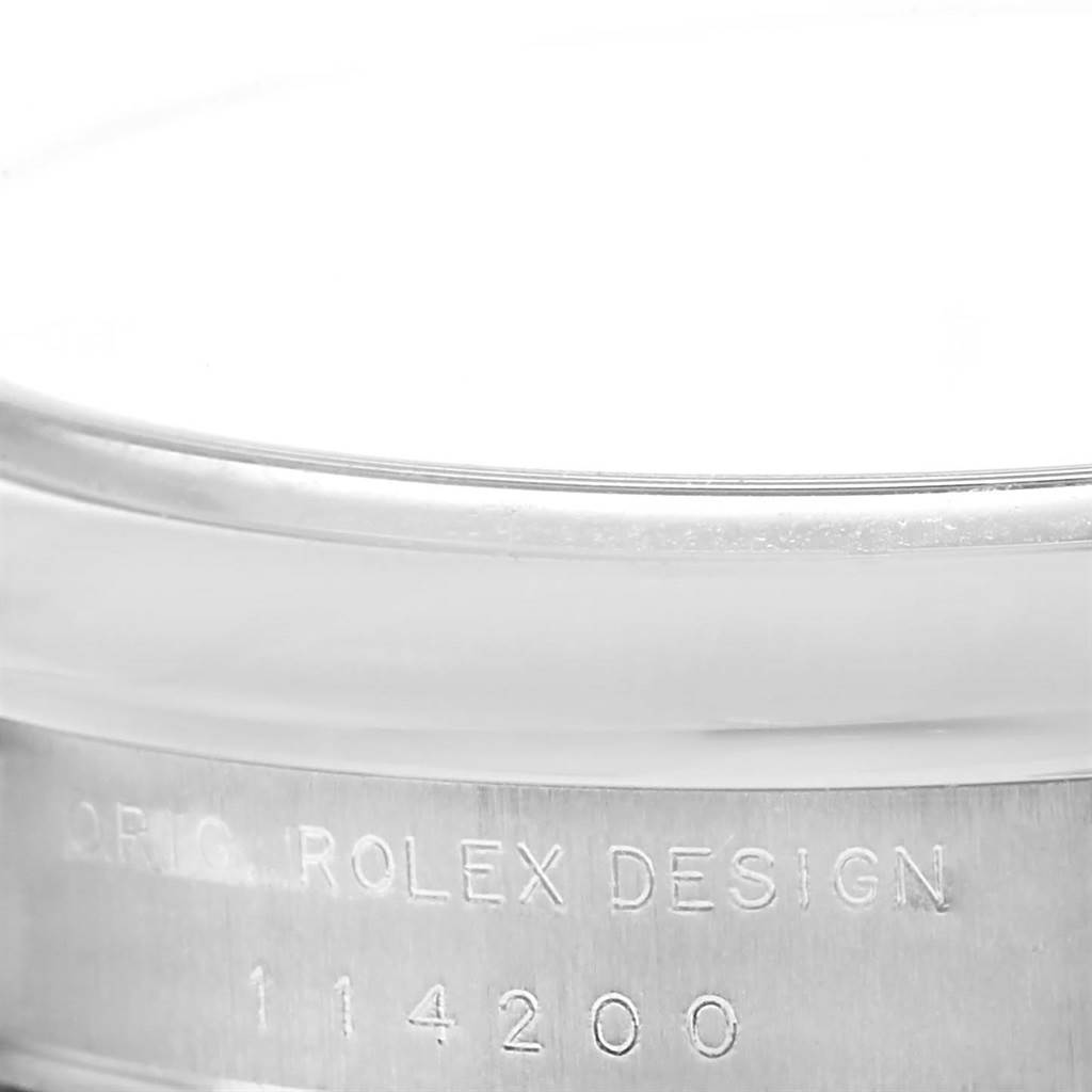 This image shows a close-up view of the side of a Rolex Air-King 114200 Men's Stainless Steel Grey Dial 114200 Men's Stainless Steel Grey Dial watch, specifically highlighting the engraved model number 114200.