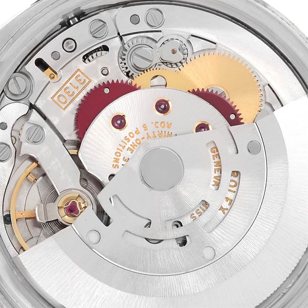 Close-up of the movement parts of a Rolex Air-King 114200 Men's Stainless Steel Grey Dial 114200 Men's Stainless Steel Grey Dial watch, showing gears and mechanisms.