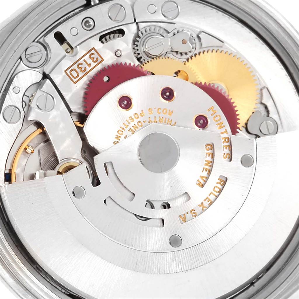 This image shows a close-up view of the Rolex Air-King 14000 Men's Stainless Steel Blue Dial 14000 Men's Stainless Steel Blue Dial watch movement mechanism and gears from the back.