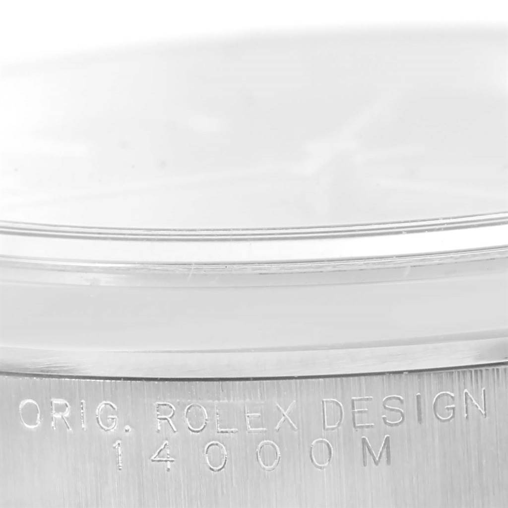 The image shows a close-up of the engraved case side of a Rolex Air-King 14000 Men's Stainless Steel Blue Dial 14000 Men's Stainless Steel Blue Dial watch, displaying "ORIG. ROLEX DESIGN 14000M."