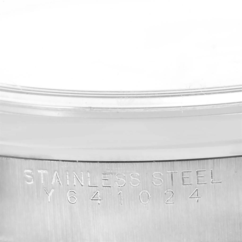 This image shows a close-up of the stainless steel case back with the serial number for the Rolex Air-King 14000 Men's Stainless Steel Blue Dial 14000 Men's Stainless Steel Blue Dial watch.