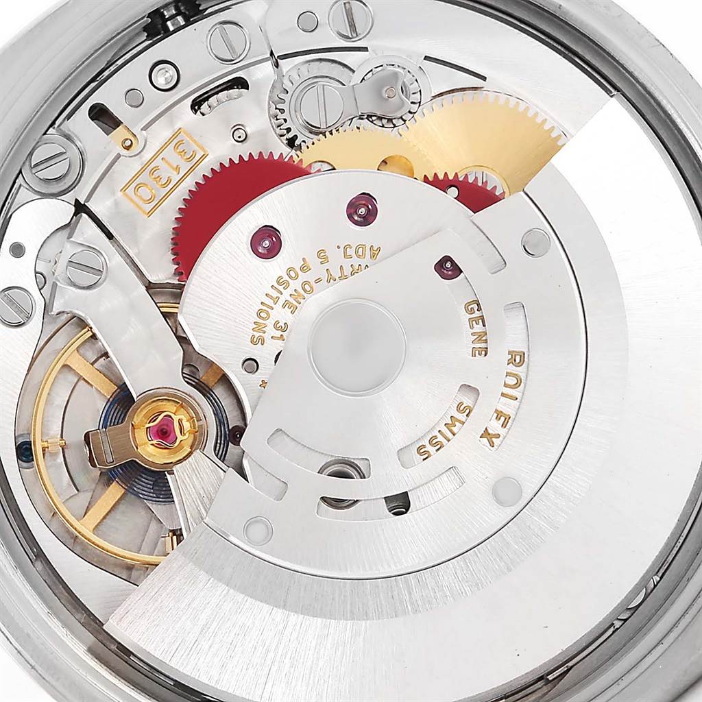 This image shows a close-up of the movement mechanism of a Rolex Air-King 114200 Men's Stainless Steel Pink Dial 114200 Men's Stainless Steel Pink Dial watch, highlighting gears and intricate components.