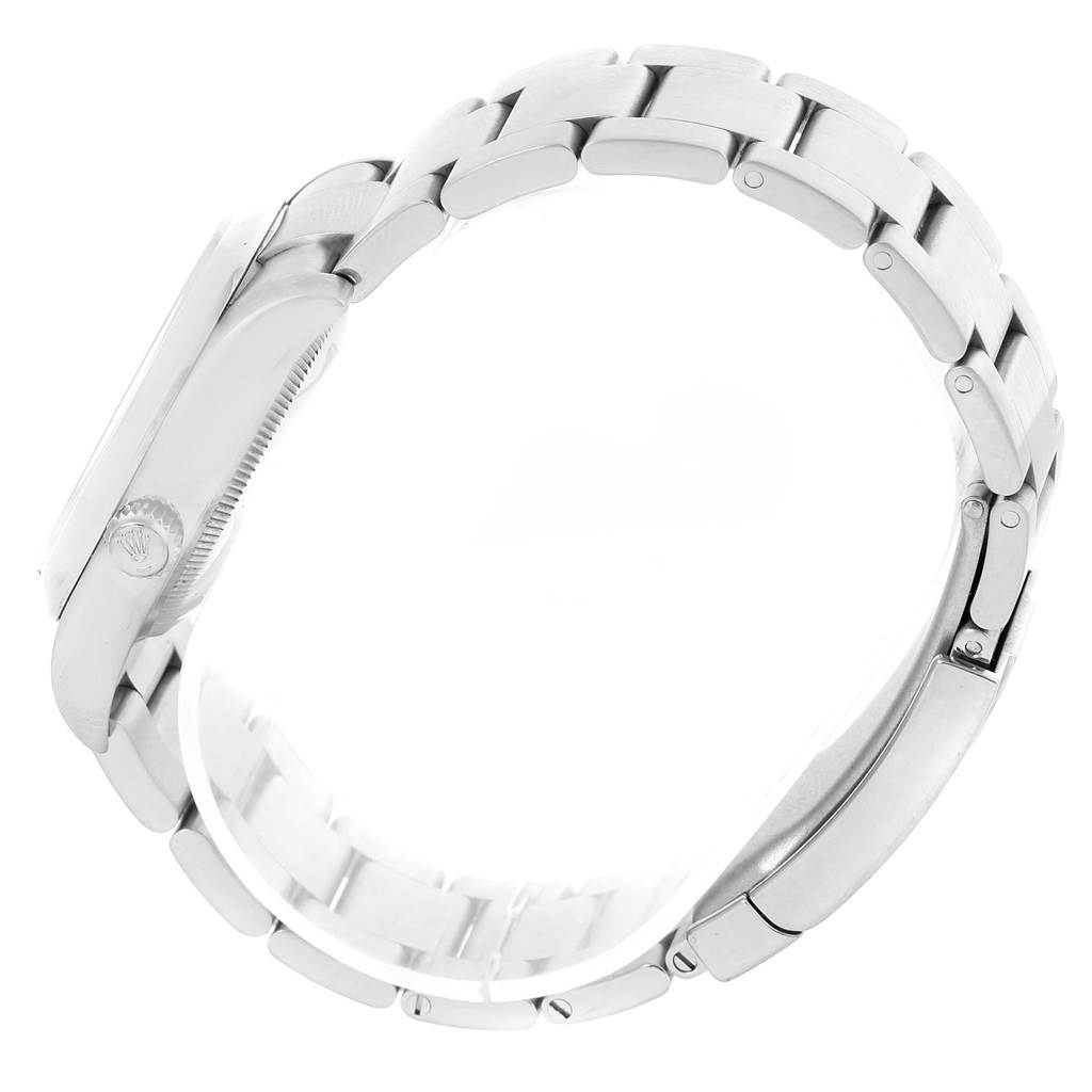 The image shows a side view of the Rolex Air-King 114200 Men's Stainless Steel Pink Dial 114200 Men's Stainless Steel Pink Dial watch, highlighting the case, crown, and metal bracelet.