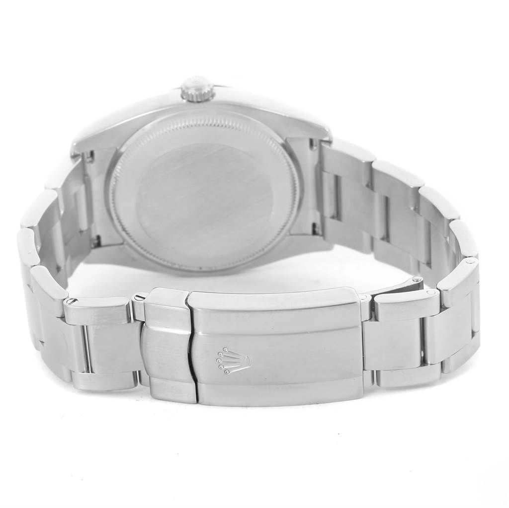 This is a rear view of the Rolex Air-King 114234 Men's Stainless Steel Pink Dial 114234 Men's Stainless Steel Pink Dial showing the back case, crown, and clasp with the Rolex logo.