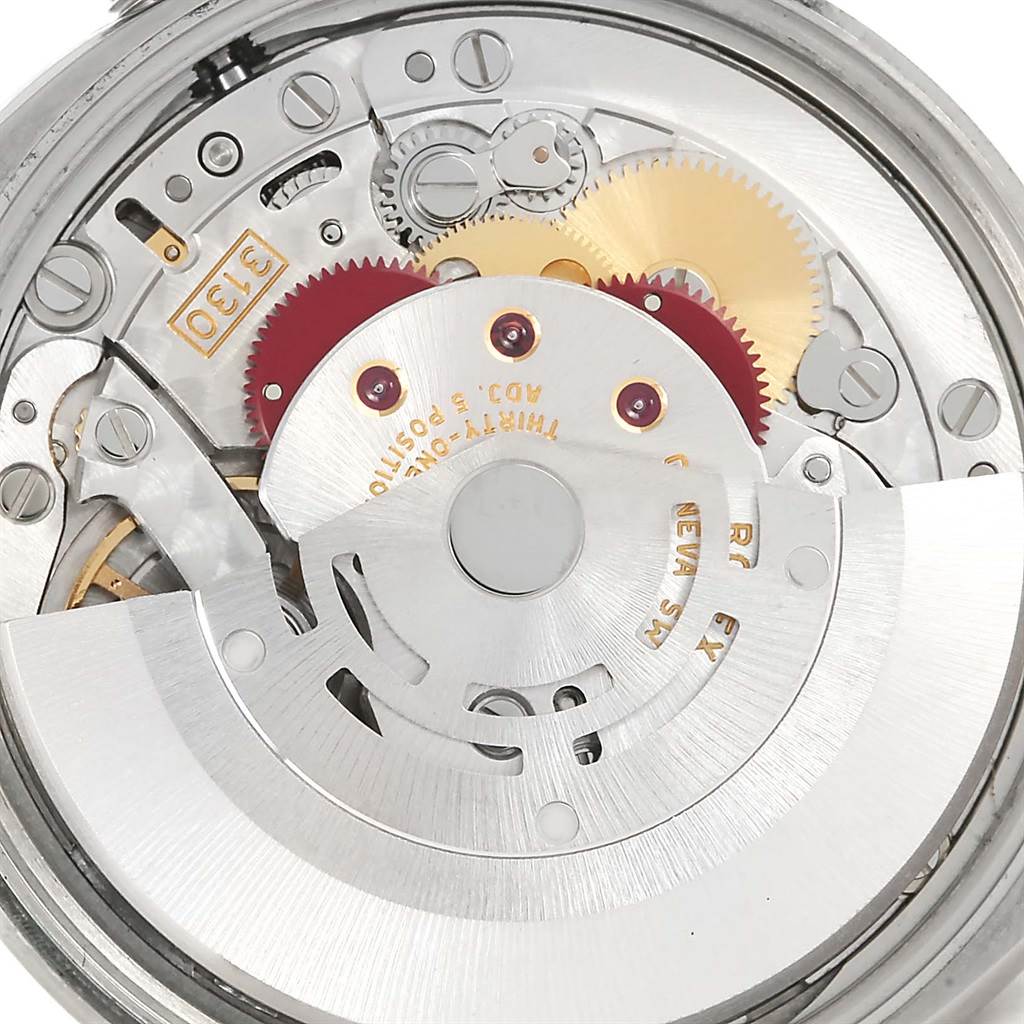 This image shows the internal mechanism and gears of the Rolex Air-King 114200 Men's Stainless Steel Silver Dial 114200 Men's Stainless Steel Silver Dial watch from a close-up, top-down angle.