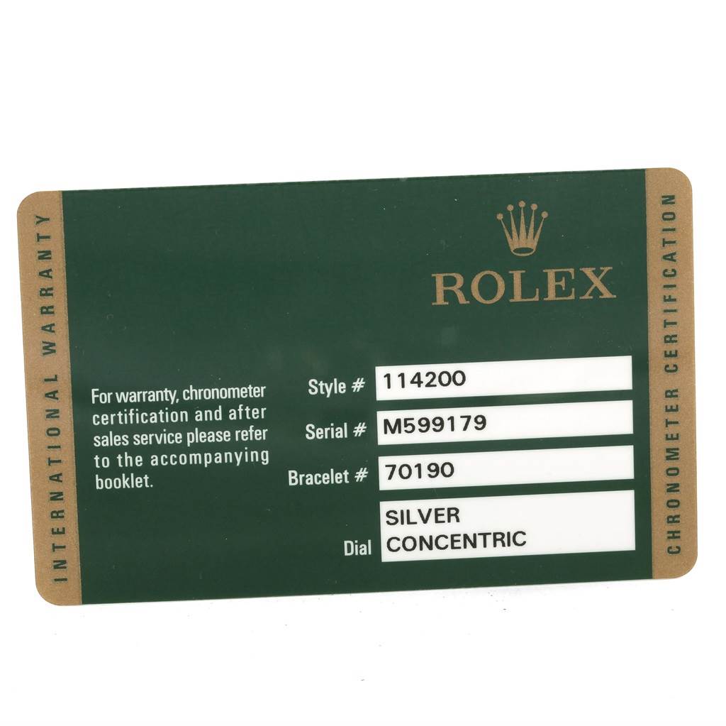 This image shows an International Warranty card for a Rolex Air-King 114200 Men's Stainless Steel Silver Dial 114200 Men's Stainless Steel Silver Dial watch, listing the style, serial, bracelet, and dial details.