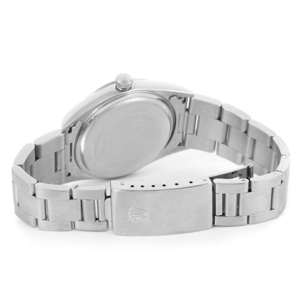 The image shows the back view of a Rolex Air-King 14000 Men's Stainless Steel Black Dial 14000 Men's Stainless Steel Black Dial watch, prominently displaying the case back and partially opened clasp.