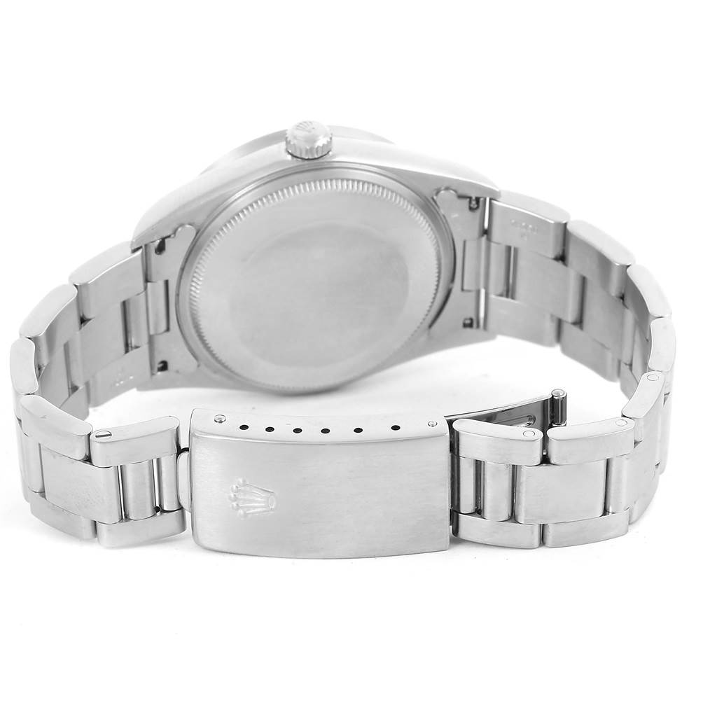 The image shows the back view and clasp of a Rolex Air-King 14010 Men's Stainless Steel Blue Dial 14010 Men's Stainless Steel Blue Dial watch, highlighting the bracelet and case back.