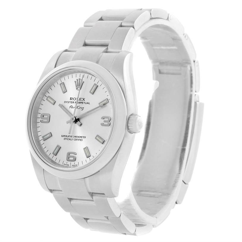 The Rolex Air-King 114200 Men's Stainless Steel Silver Dial 114200 Men's Stainless Steel Silver Dial watch is showcased at a three-quarter angle, displaying its dial, bezel, crown, and bracelet.