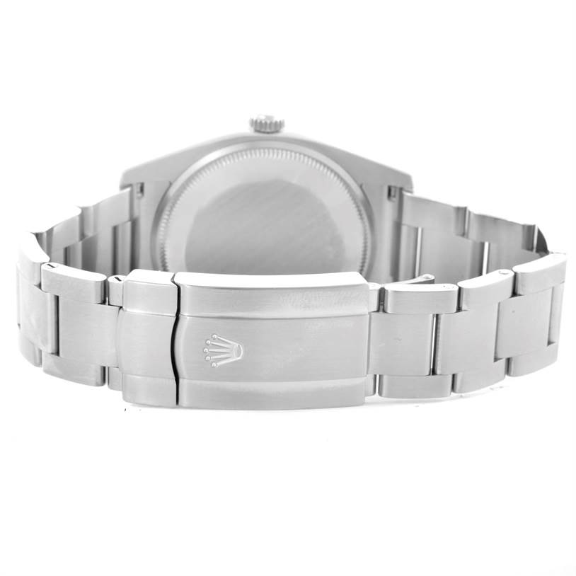 This image shows the clasp and back of the stainless steel bracelet of a Rolex Air-King 114200 Men's Stainless Steel Silver Dial 114200 Men's Stainless Steel Silver Dial watch.