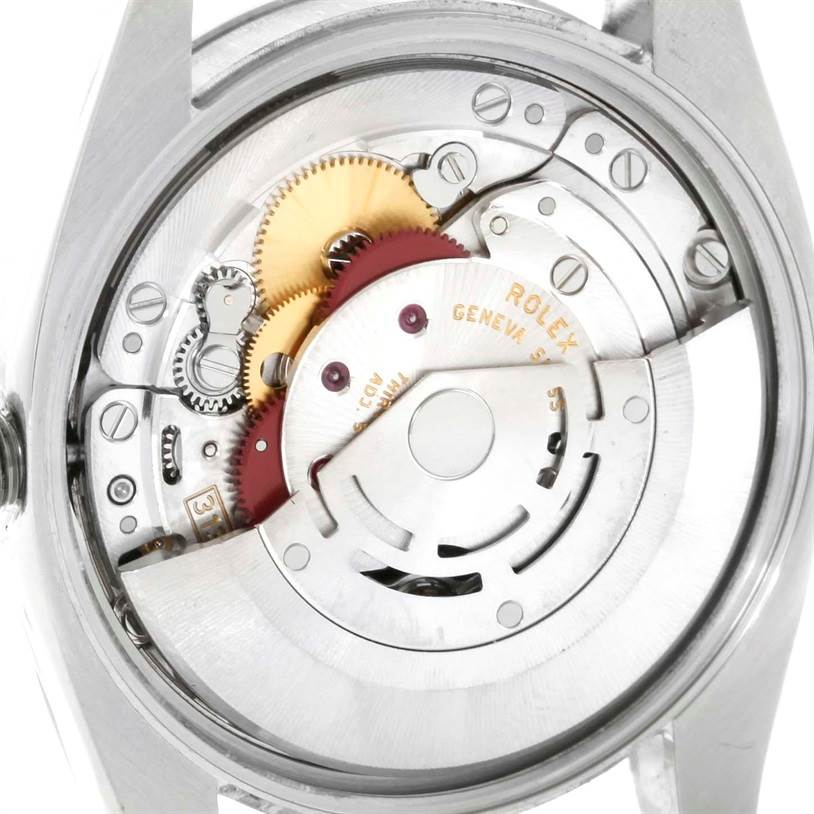 This image shows the internal mechanical components and movement of the Rolex Air-King 114200 Men's Stainless Steel Silver Dial 114200 Men's Stainless Steel Silver Dial watch, viewed from the back.