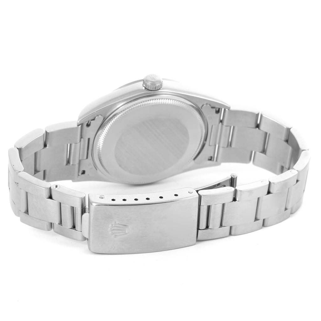 The image shows the back view of the Rolex Air-King 14000 Men's Stainless Steel Blue Dial 14000 Men's Stainless Steel Blue Dial watch, highlighting its case back, bracelet, and clasp.