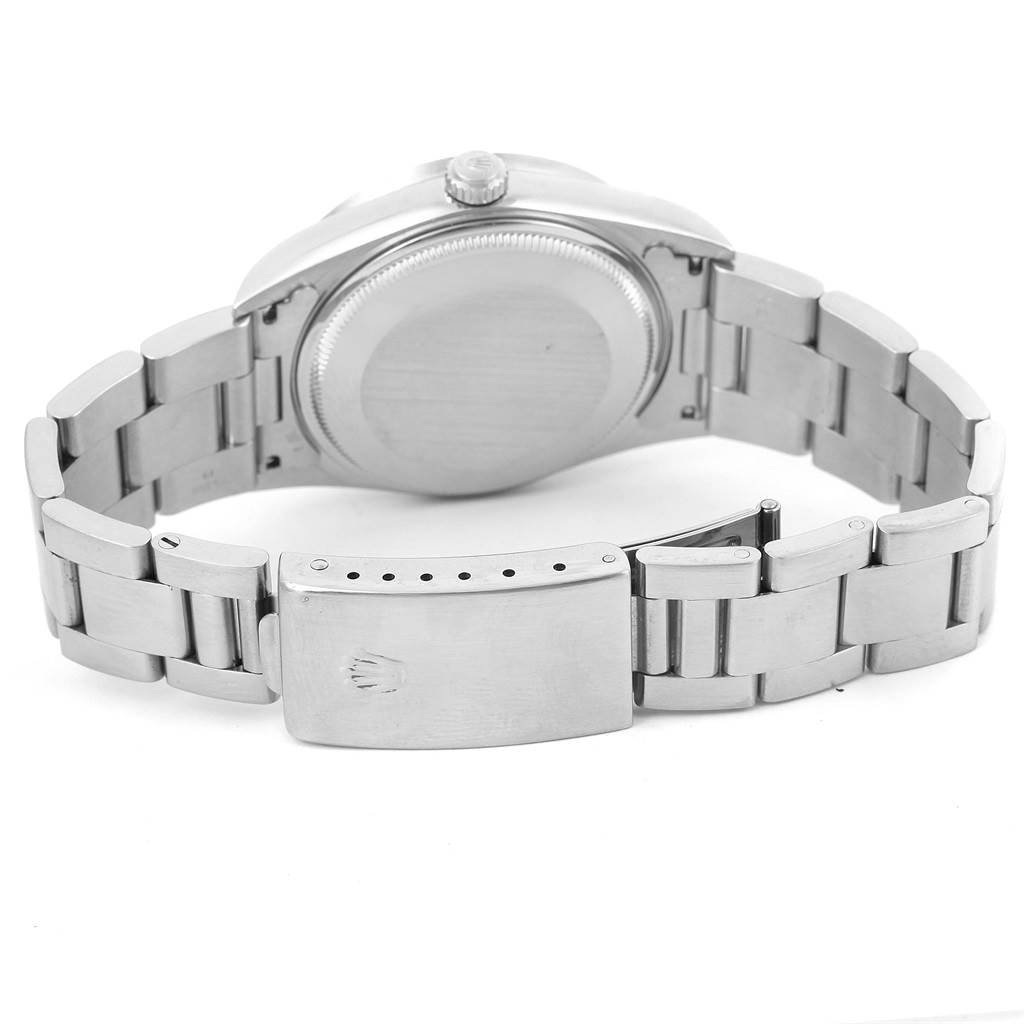 This image shows the back of the Rolex Air-King 14010 Men's Stainless Steel White Dial 14010 Men's Stainless Steel White Dial watch, highlighting its case back and bracelet.