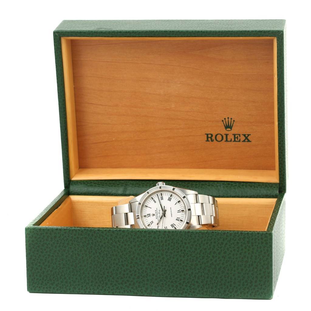 This is a Rolex Air-King 14010 Men's Stainless Steel White Dial 14010 Men's Stainless Steel White Dial watch shown in an open green and wooden Rolex box.